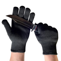 Thumbnail for Black knitted safety gloves pictured with a knife across the palm